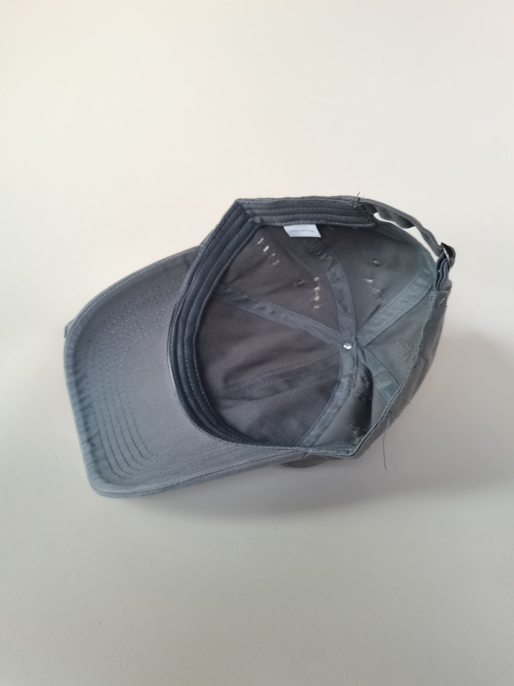 Distressed Grey Baseball Cap with Ripped Details